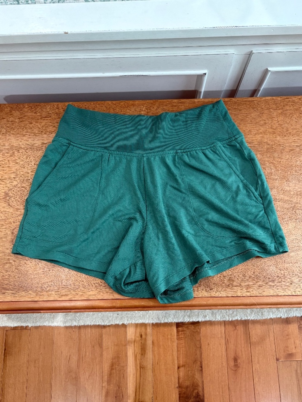 Athleta Coaster Luxe High Rise Shorts. Color Green. Size medium